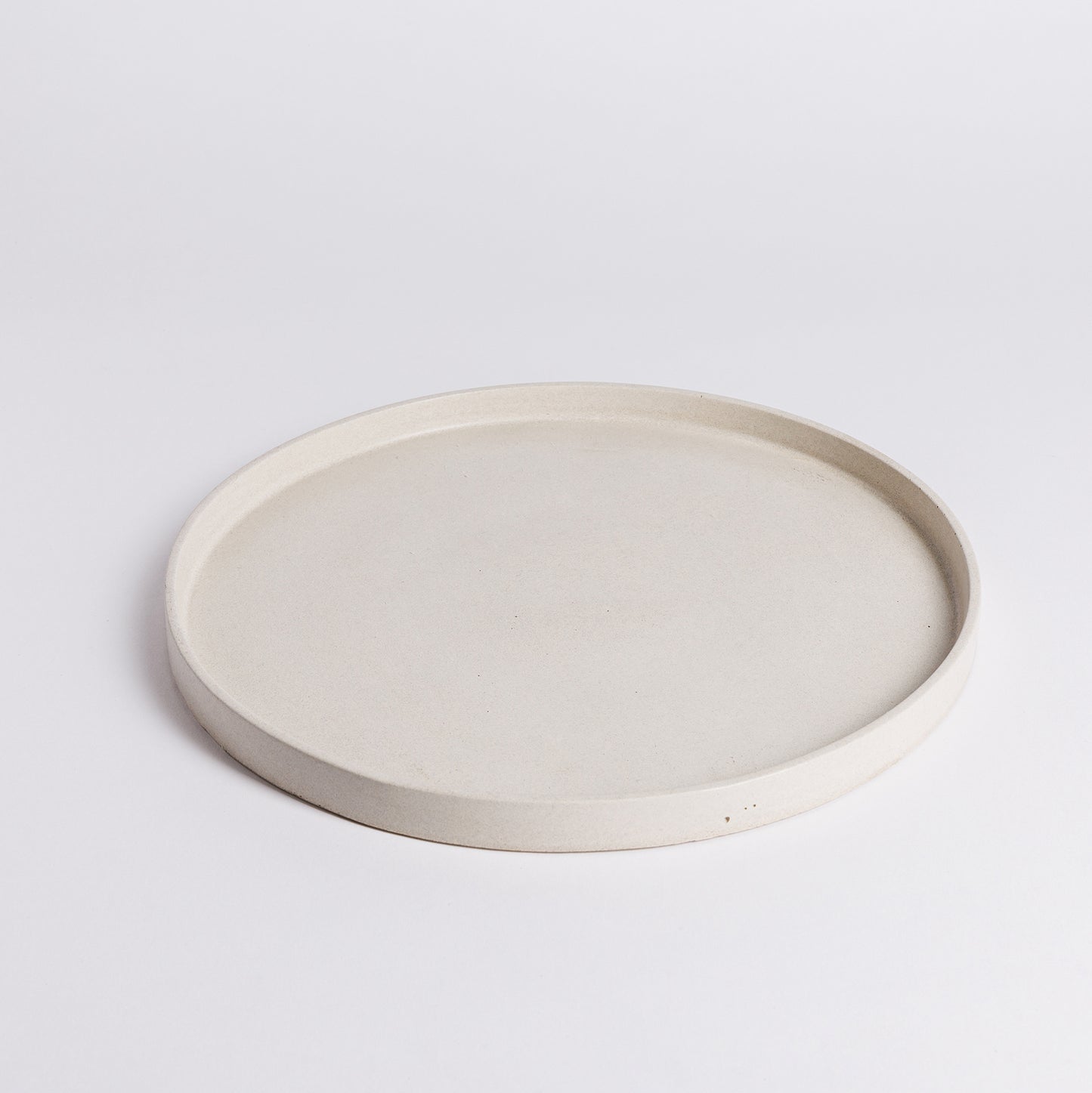 Round and rectangular concrete tray