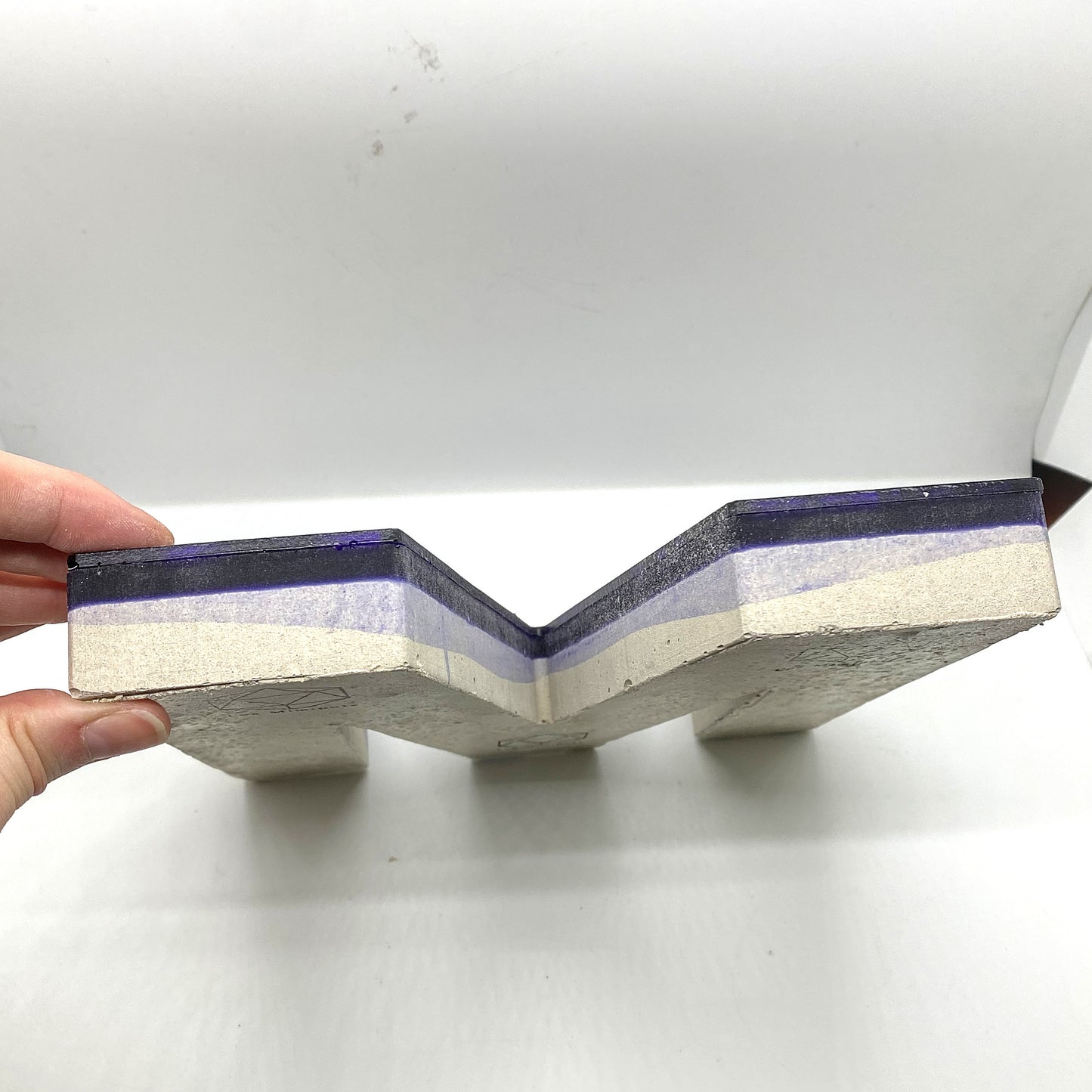 Epoxy-concrete letter M