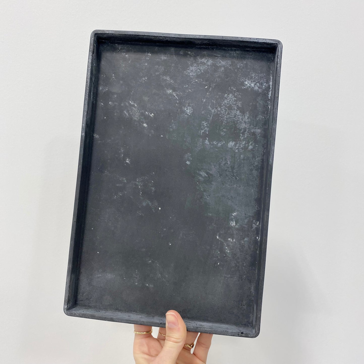 Round and rectangular concrete tray