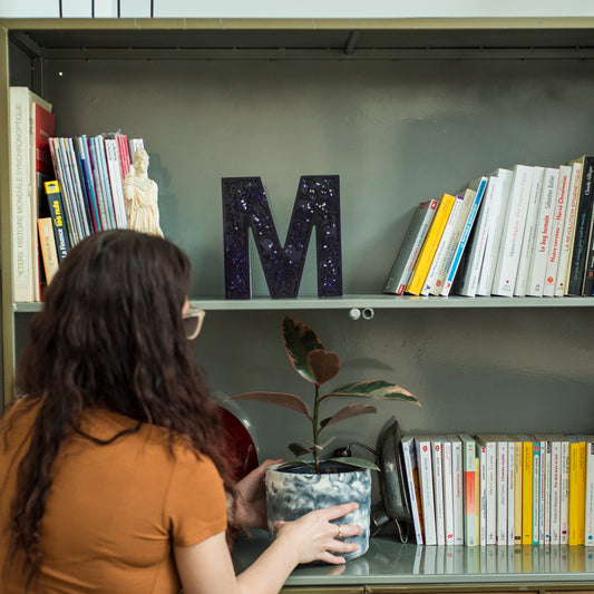 Epoxy-concrete letter M